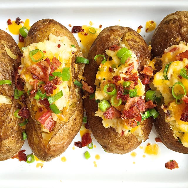 a few baked potatoes stuffed bacon and cheddar then topped with chives