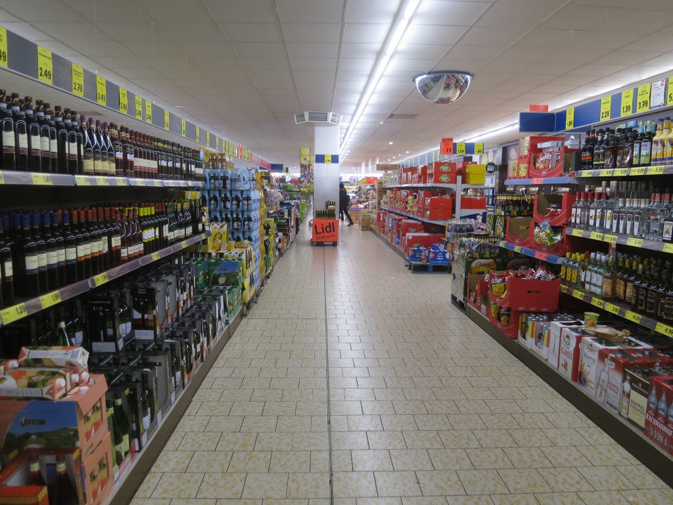 Retail, Convenience store, Supermarket, Aisle, Grocery store, Marketplace, Trade, Bottle, Market, Plastic bottle, 