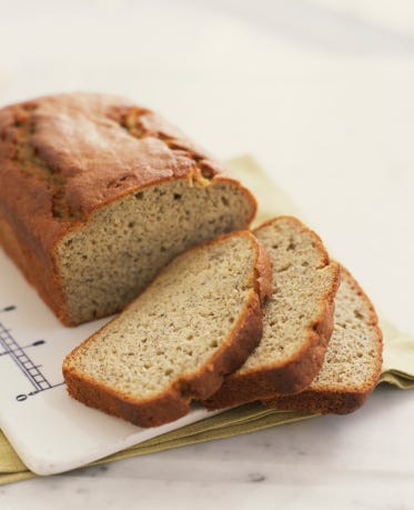 Bread, Food, Baked goods, Loaf, Cuisine, Gluten, Snack, Brown bread, Dish, Baking, 