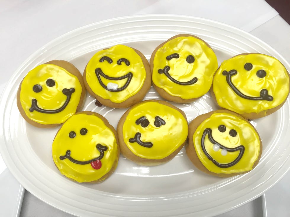 Emoticon, Yellow, Smiley, Food, Facial expression, Baked goods, Black, Dessert, Finger food, Icon, 
