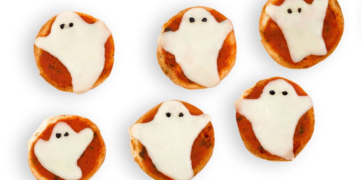 Best Ghost Mini Pizzas - How to Make Ghost Mini Pizzas - Delish.com