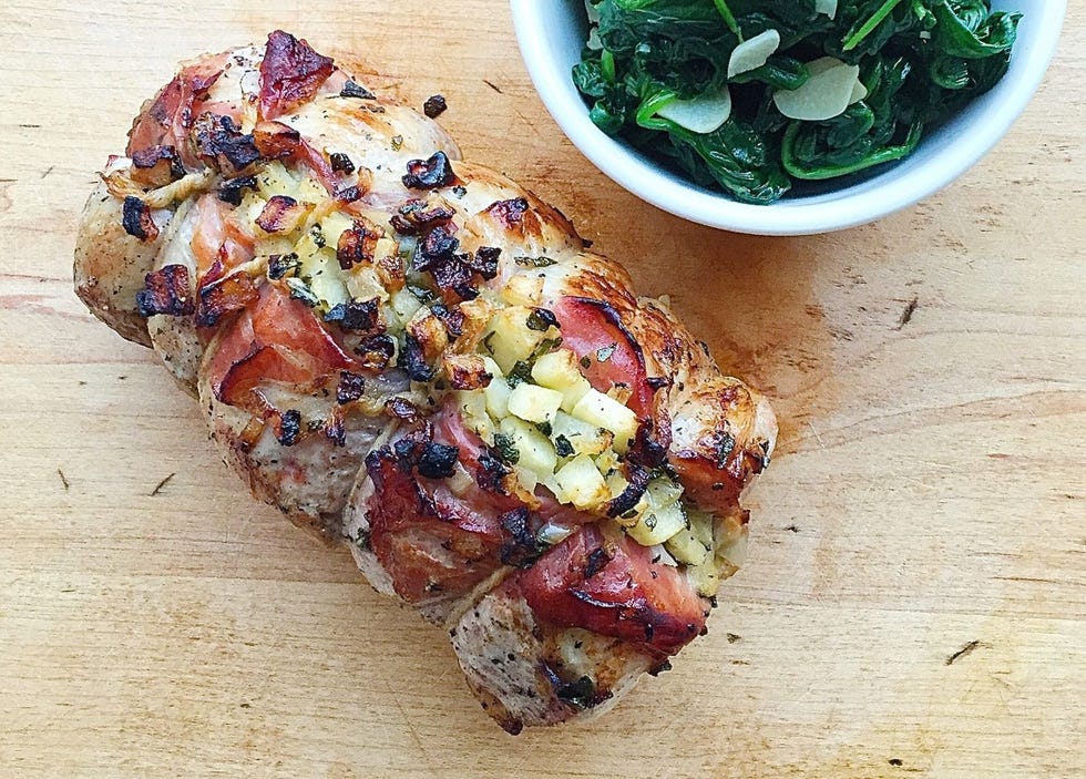 apple, sage, and prosciutto stuffed pork loin with sauteed spinach