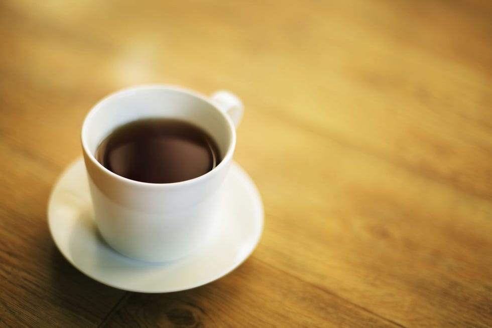 Black coffee in white cup