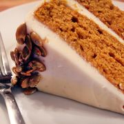 Pumpkin Spice Cake with Cream Cheese Icing and Salted Pumpkin Seeds