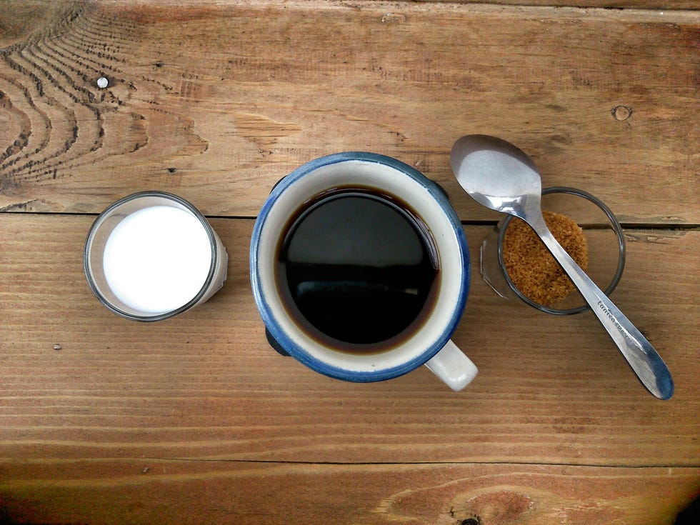 Wood, Circle, Hardwood, Wood stain, Plywood, Eye glass accessory, Kitchen utensil, Chemical compound, Varnish, Magnifier, 