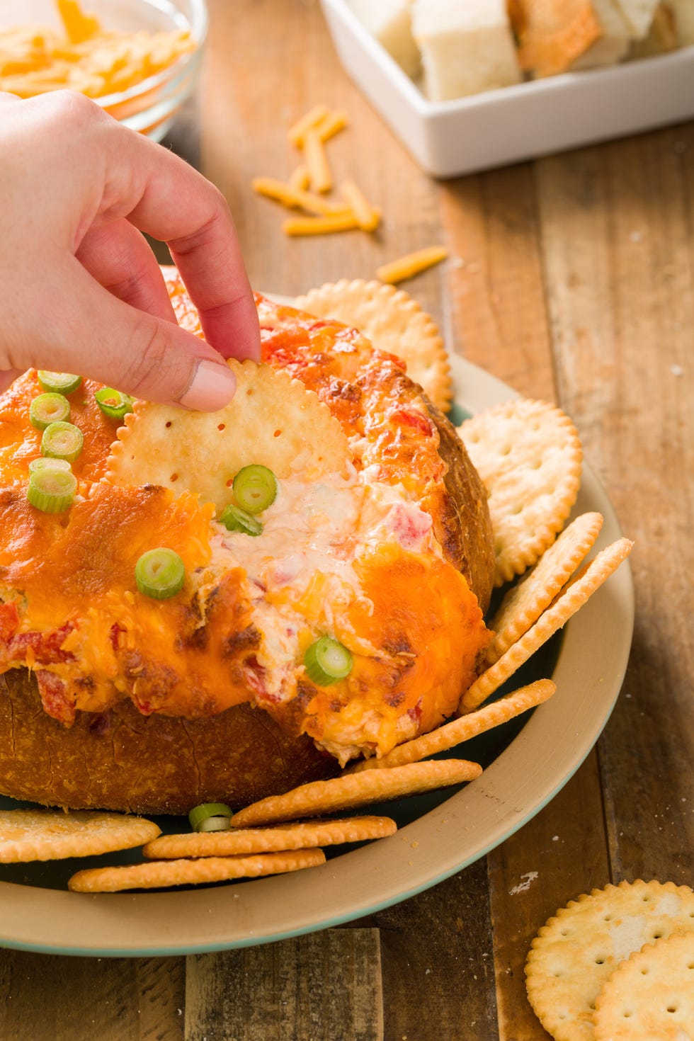 baked pimento cheese dip in a bread bowl