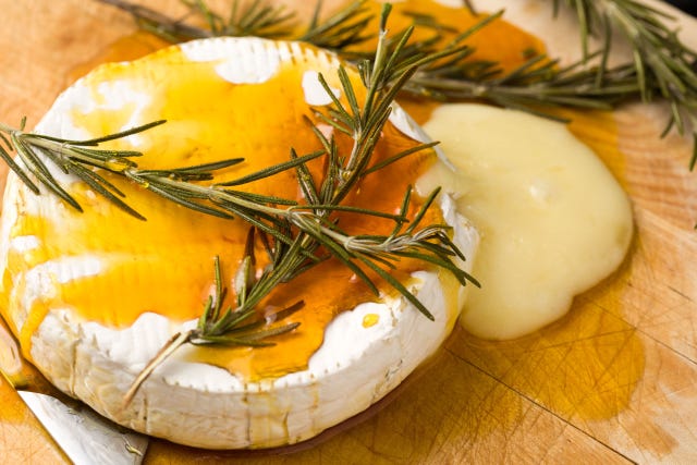 Baked Brie with Honey and Rosemary - Delish.com baked brie with honey and rosemary