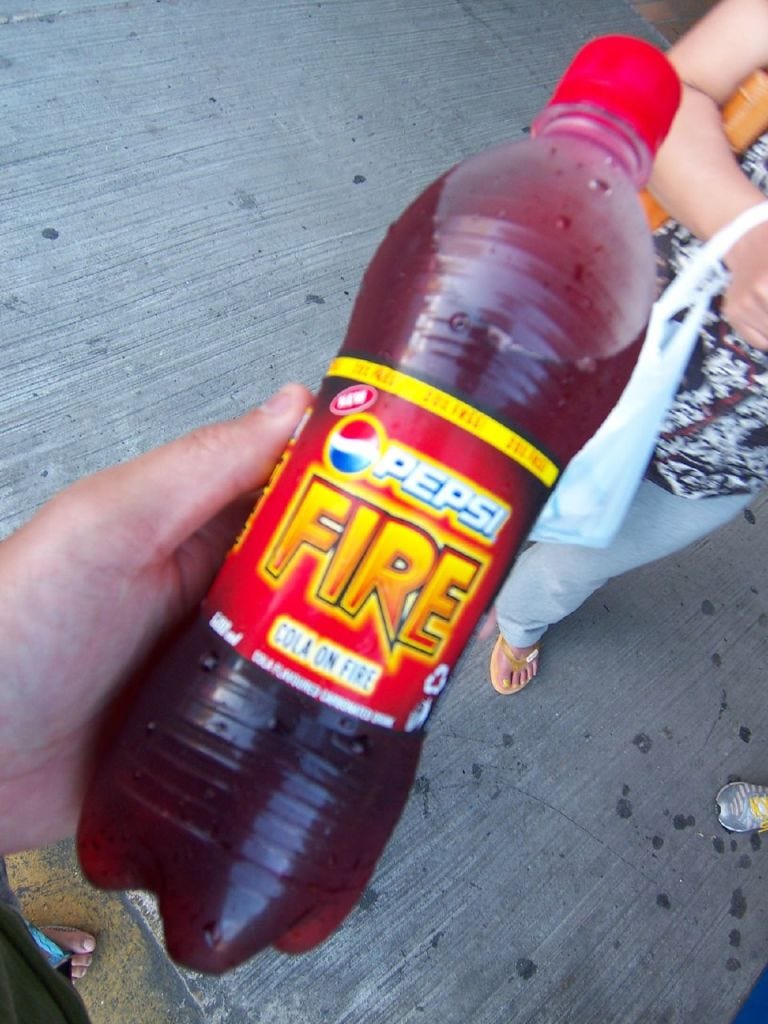 Finger, Bottle, Liquid, Red, Drinkware, Carmine, Nail, Plastic bottle, Bracelet, Thumb, 