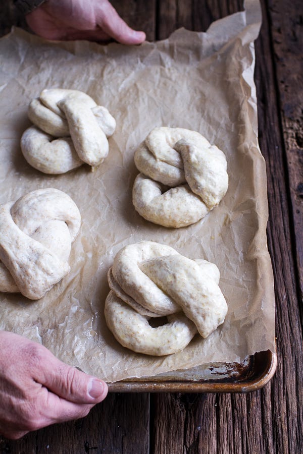 Finger, Wood, Food, Artifact, Carving, Relief, Dough, Baker's yeast, Sculpture, Kitchen utensil, 
