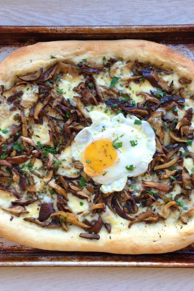 wild mushroom pizza with fontina and egg
