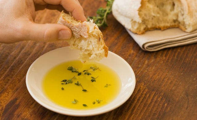 Dipping Bread in Olive Oil