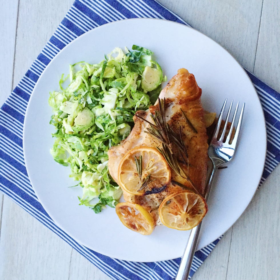 lemon, garlic, and rosemary roasted chicken breasts with brussels sprouts slaw