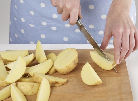 Finger, Yellow, Food, Wood, Ingredient, Produce, Fruit, Kitchen utensil, Cutting board, Kitchen knife, 