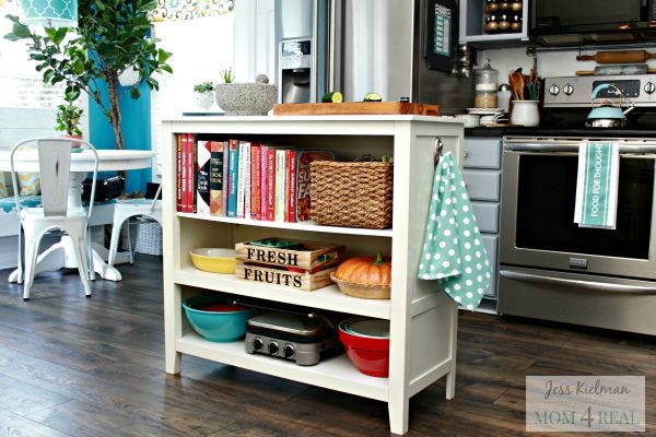 Wood, Room, Interior design, Display device, Floor, Shelving, Shelf, Flooring, Furniture, Home, 