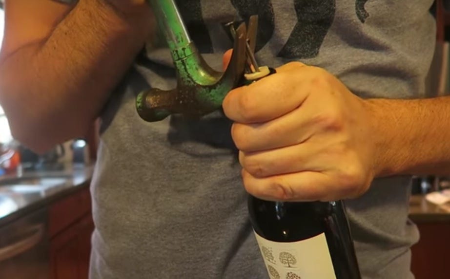 Finger, Bottle, Alcohol, Drink, Glass bottle, Alcoholic beverage, Wine bottle, Thumb, Metalworking hand tool, Wine, 