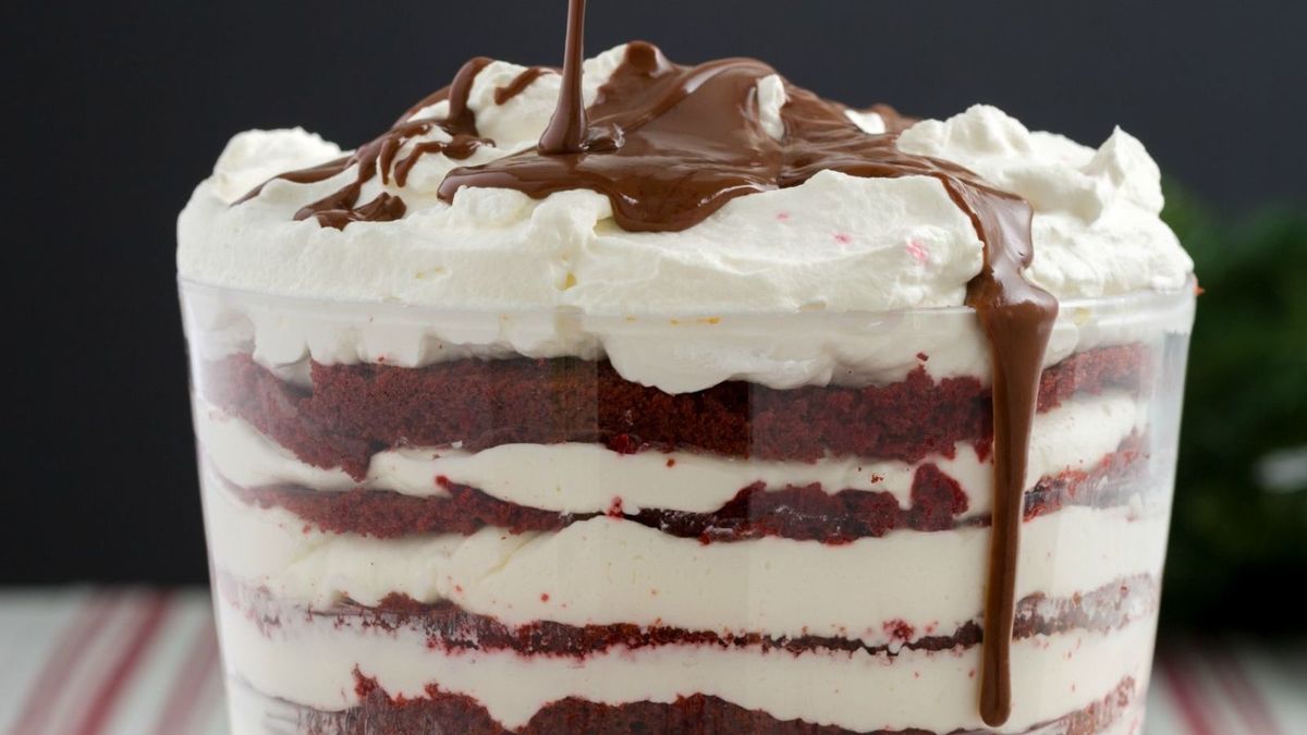 https://hips.hearstapps.com/del.h-cdn.co/assets/15/52/1600x900/hd-aspect-1450706821-red-velvet-trifle-drizzle.jpg?resize=1200:*