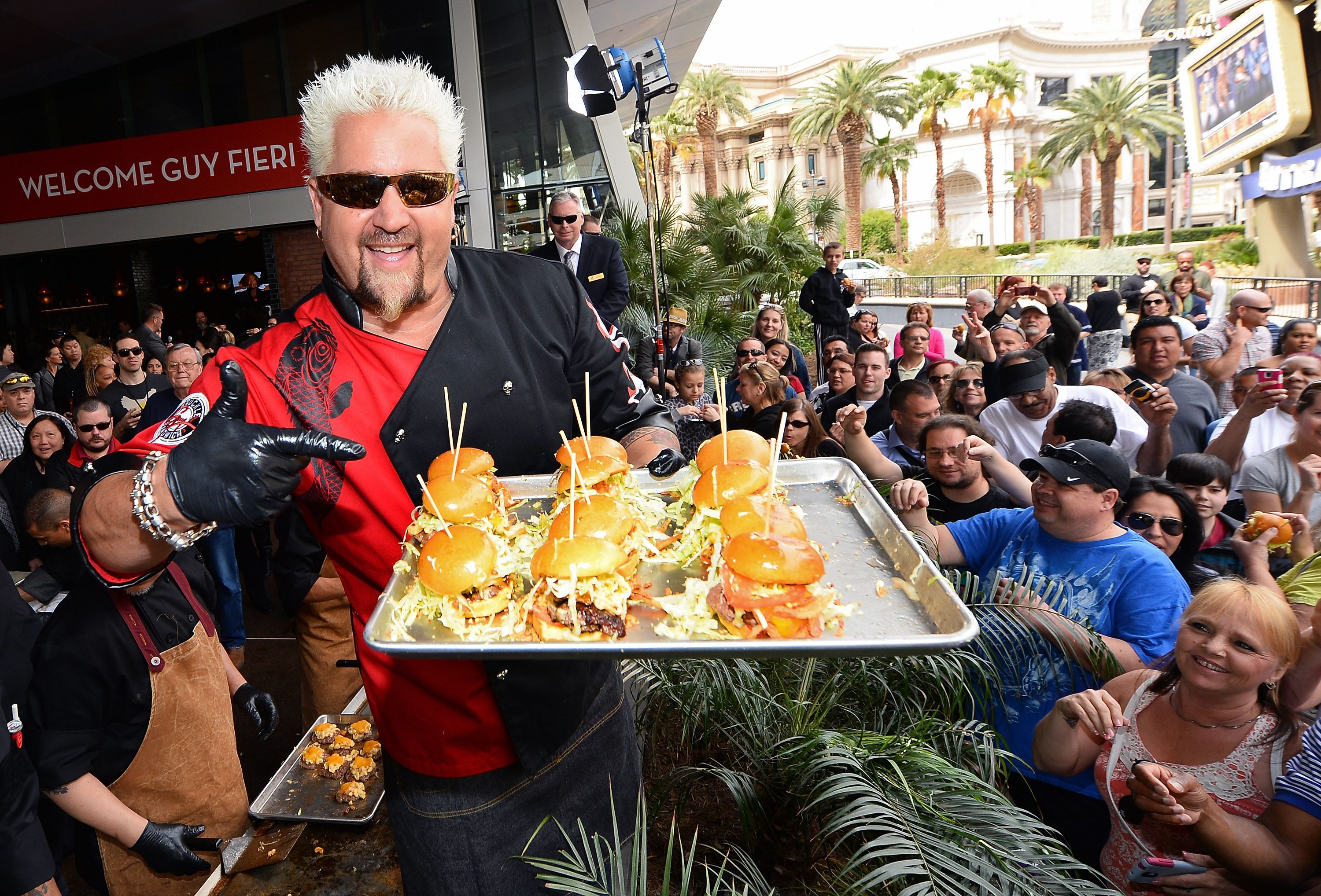 Guy Fieri Is Trying To Get Out Of His Restaurant Chain Johnny Garlic S Guy Fieri Wants Is Finished With Johnny Garlic S Restaurant