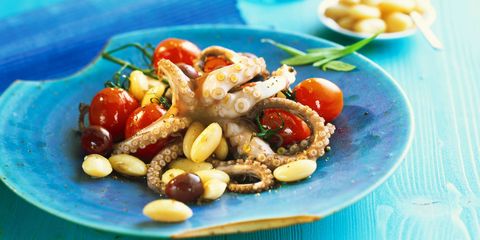 Octopus salad on blue plate