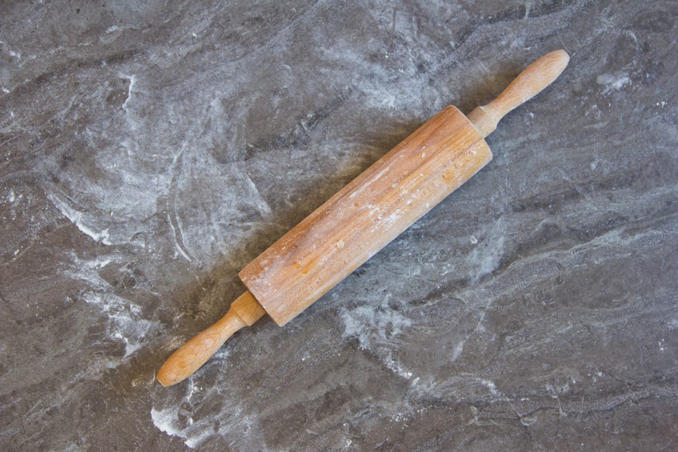 Wood, Tool, Natural material, Tan, Antique tool, File, Kitchen utensil, Blade, Hand tool, 