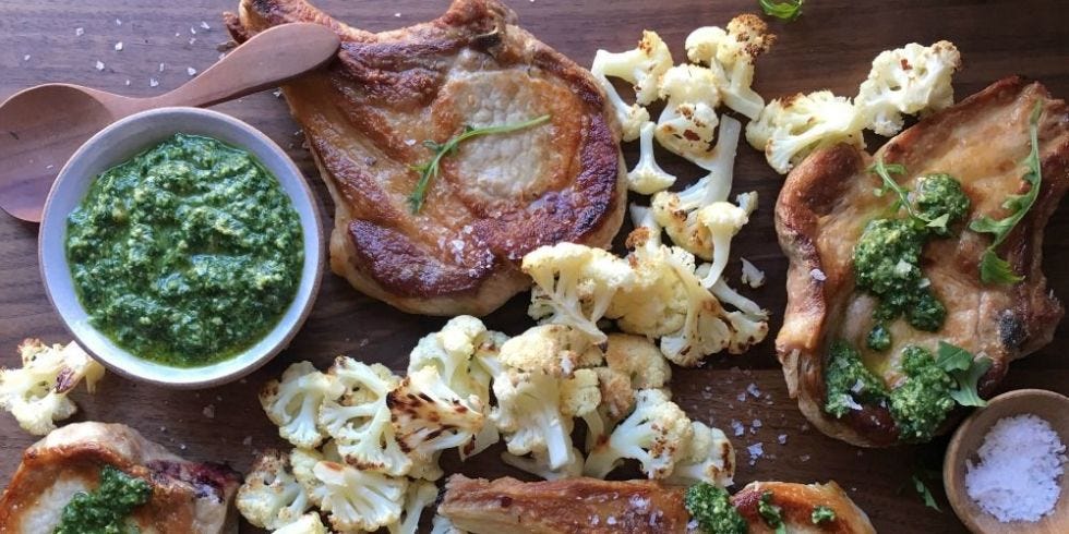 Pork Chops with Arugula Pesto and Roasted Cauliflower