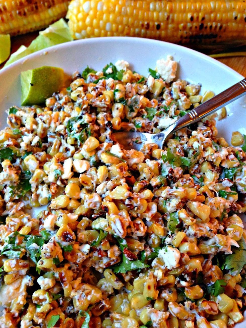 https://hips.hearstapps.com/del.h-cdn.co/assets/16/07/1024x1365/mexican-cilantro-lime-corn-crema.jpg?resize=980:*