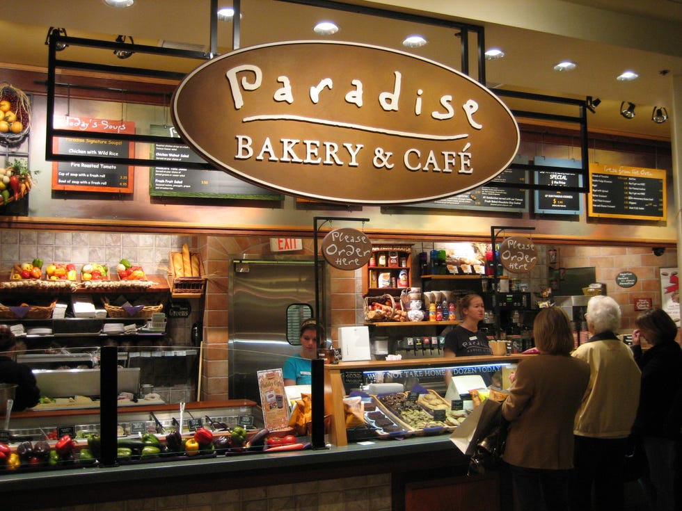 Lighting, Retail, Trade, Customer, Fast food restaurant, Restaurant, Light fixture, Marketplace, Food court, Menu, 