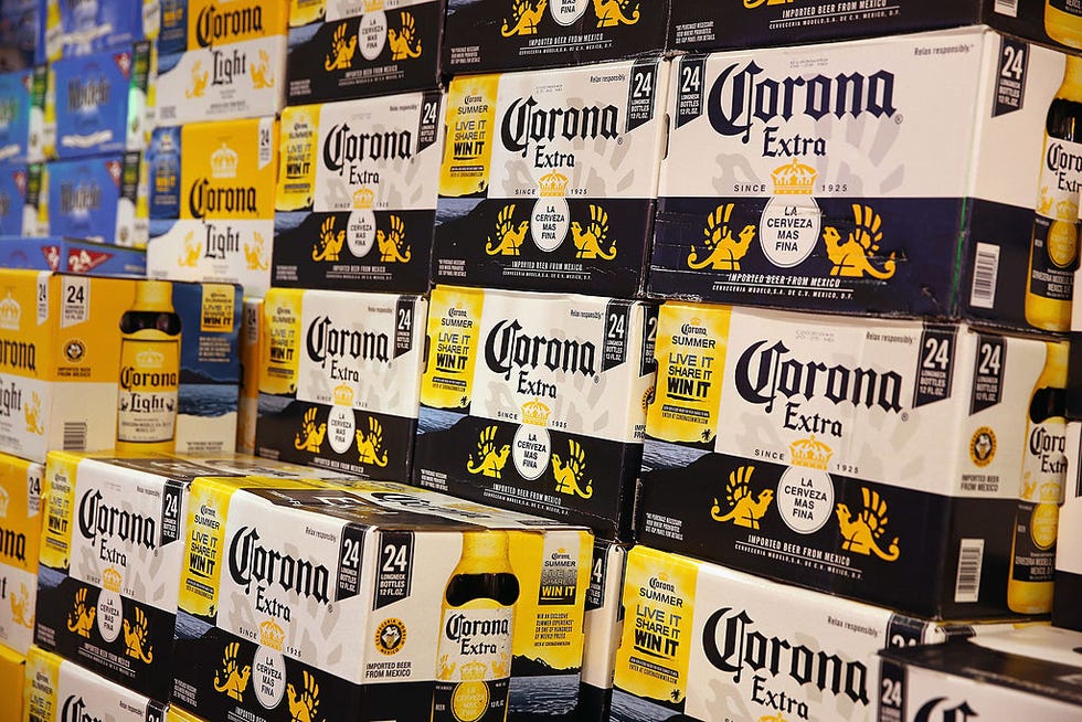 Yellow, Logo, Brand, Label, Packaging and labeling, Advertising, Sticker, Carton, Box, 