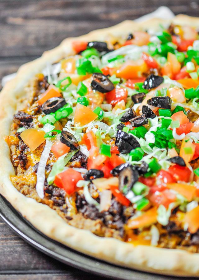 Mexican-Italian fusion pizza with grilled chicken and vegetables