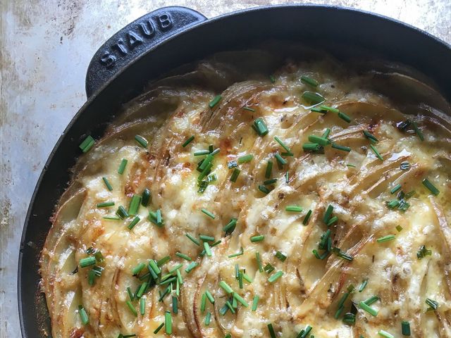 Skillet Scalloped Potatoes with Chive Butter Recipe - Delish.com