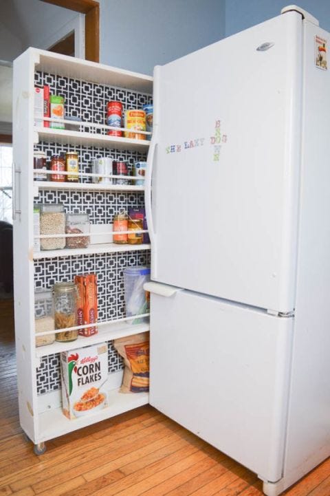Floor, Flooring, Major appliance, Freezer, Wood flooring, Refrigerator, Laminate flooring, Hardwood, Bottle, Kitchen appliance, 