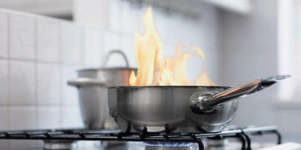 Stove, Gas stove, Cookware and bakeware, Kitchen stove, Cooktop, Cooking, Gas, Smoke, Kitchen appliance accessory, Flame, 
