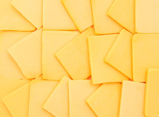Yellow, Orange, Line, Amber, Tan, Close-up, Symmetry, Peach, Paper product, Recipe, 