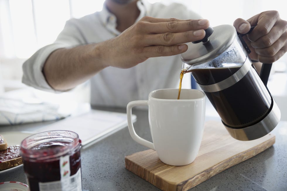 Finger, Serveware, Drinkware, Hand, Cup, Table, Dishware, Tableware, Small appliance, Coffee cup, 