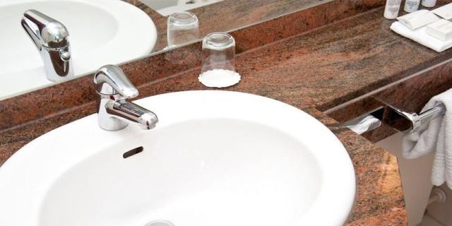 Fluid, Brown, Bathroom sink, Plumbing fixture, Tap, Liquid, Sink, Porcelain, Ceramic, Bathroom accessory, 