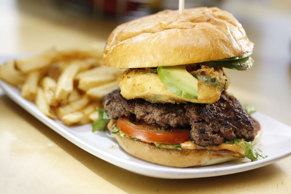 SHOT 10/8/13 1:04:04 PM - Crave Real Burgers menu items and shakes at their Highlands Ranch, Co. location. Big, juicy burgers made with fresh ground chuck, hand-pressed on a searing hot flat top grill to seal in all the happiness. (Photo by Marc Piscotty / © 2013)