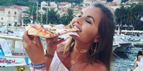 Girl Eating Pizza
