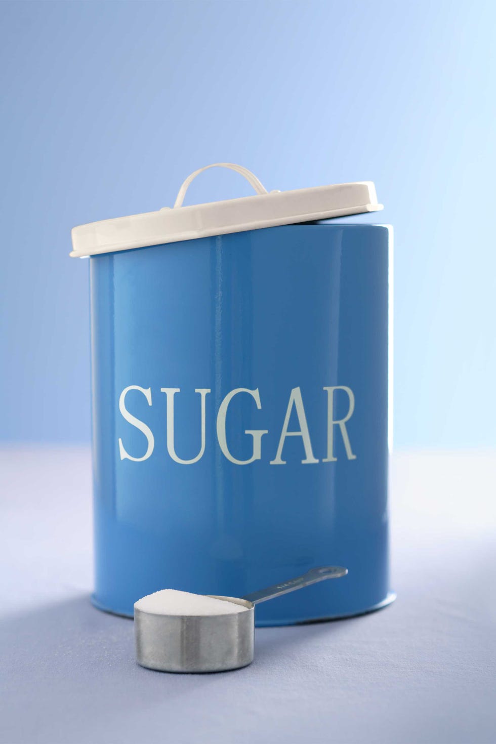 Blue, Electric blue, Household supply, Azure, Aqua, Cylinder, Office supplies, Label, Paint, Cosmetics, 