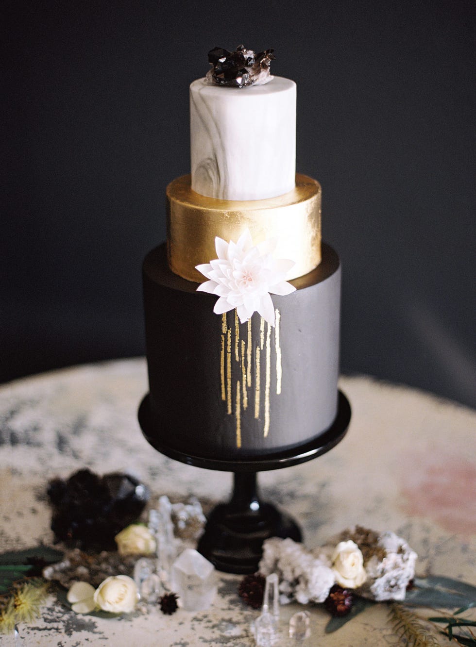 <p>Cake by <span class="redactor-invisible-space"><a href="http://www.sweetandsaucyshop.com/" target="_blank">Sweet and Saucy Shop</a>.</span></p>