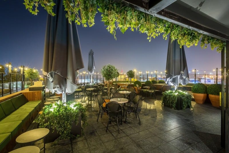Interior design, Real estate, Furniture, Interior design, Shade, Design, Houseplant, Resort, Couch, Outdoor structure, 