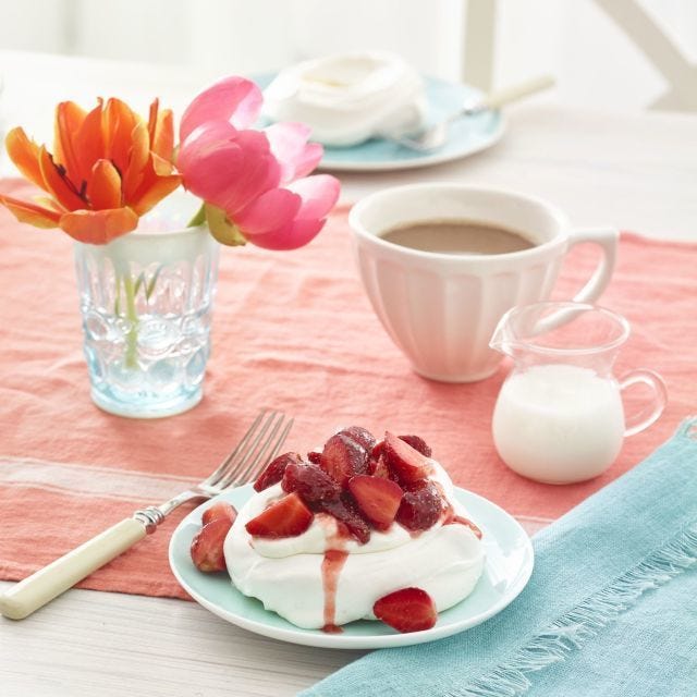 Pavlovas with Strawberries and Cream Recipe - WomansDay.com Pavlovas with Strawberries and Cream Recipe - WomansDay.com