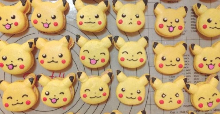 Yellow, Snout, Fawn, Collection, Animal figure, Toy, Felidae, Pattern, Paper product, 