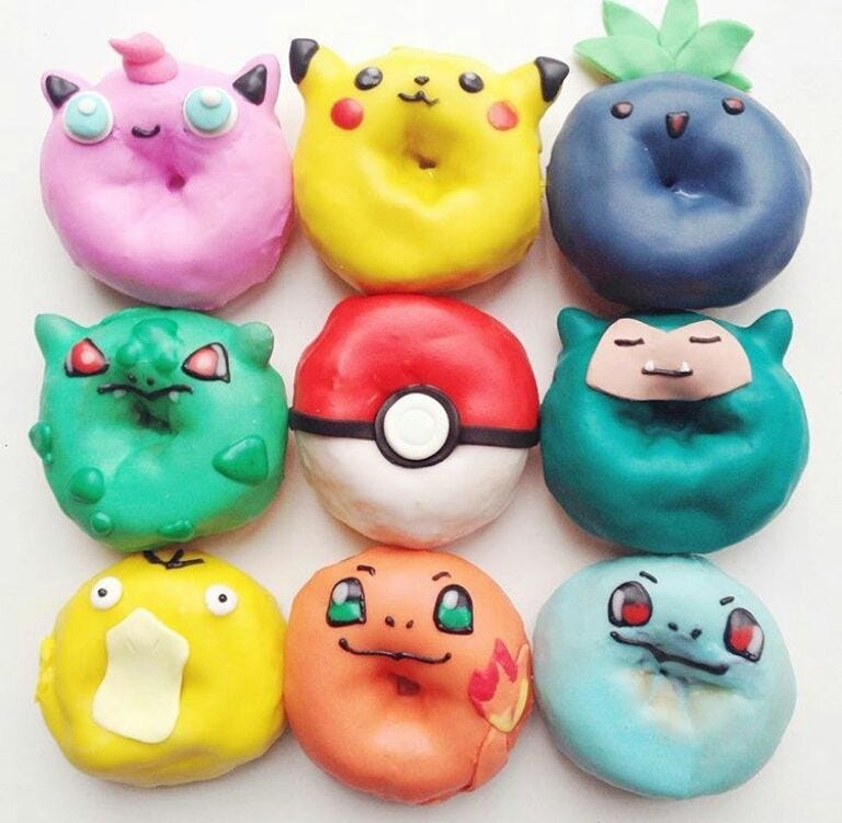 Ingredient, Facial expression, Toy, Teal, Dessert, Snack, Confectionery, Collection, Fictional character, Finger food, 