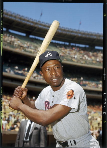 Baseball bat, Baseball player, Baseball equipment, Baseball, Vintage base ball, Baseball uniform, Team sport, Batting glove, Sports equipment, Intramural softball, 