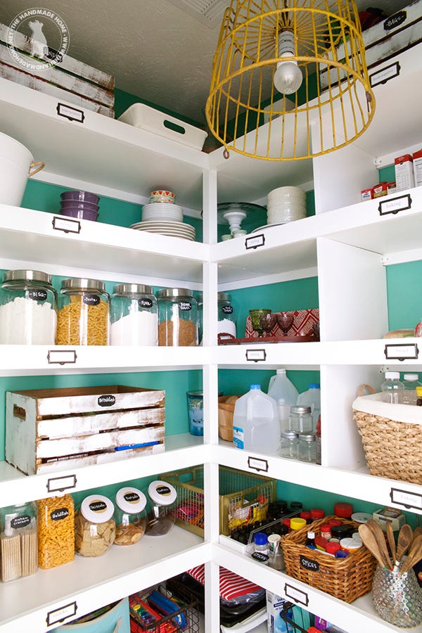 Green, Interior design, Room, Ceiling, Light fixture, Teal, Turquoise, Aqua, Ceiling fixture, Shelf, 