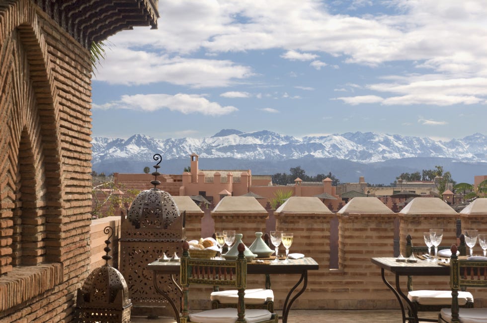 Cloud, Mountain range, Table, Furniture, Outdoor furniture, Outdoor table, Mountain, Cumulus, Summit, Ridge, 