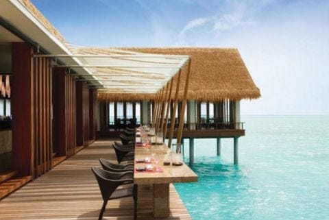 Outdoor furniture, Resort, Ocean, Hardwood, Sea, Thatching, Outdoor table, Pier, Shade, Beach, 