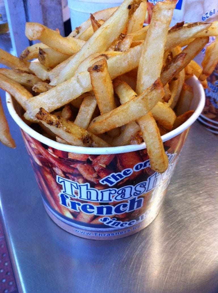 Food, Brown, Yellow, Fried food, Deep frying, Photograph, White, French fries, Ingredient, Root vegetable, 