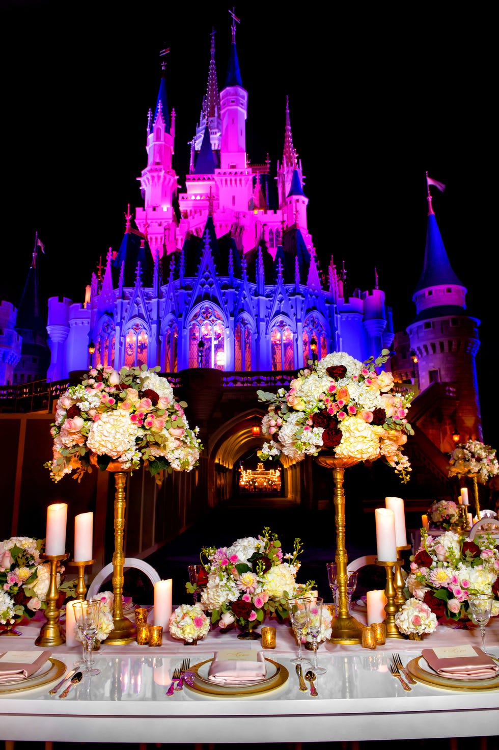 Landmark, Spire, Walt disney world, Tourist attraction, Turret, Flower Arranging, Decoration, Festival, Steeple, Floral design, 