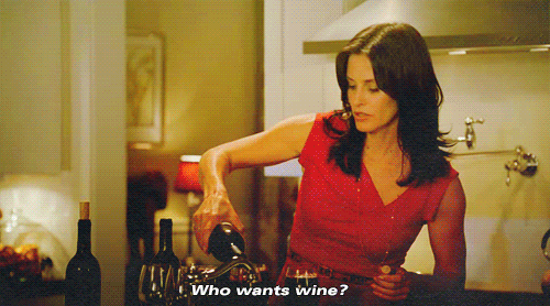 Hairstyle, Shoulder, Glass bottle, Bottle, Drink, Alcohol, Long hair, Alcoholic beverage, Distilled beverage, Waist, 