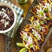 Beef-and-Pineapple Tacos with Mojo Beans Recipe - Country Living